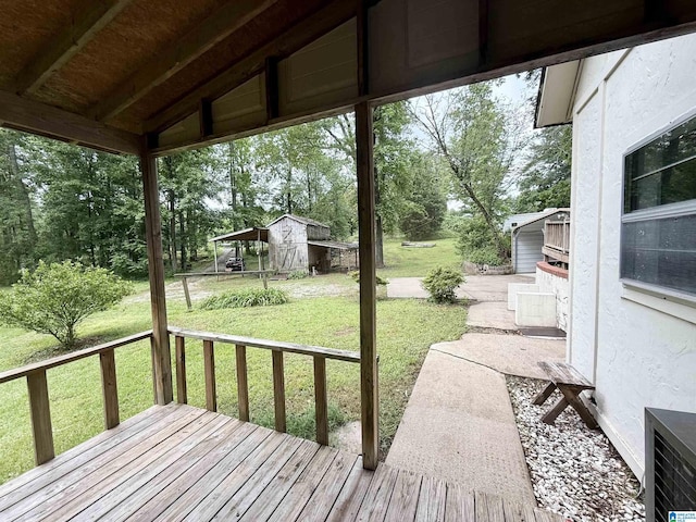 1790 Mount View Rd, Wellington, AL 36279 - wooden terrace with a lawn and view of wooded area