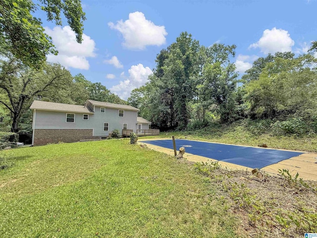 7371 Thomas Hall Dr, Trussville, AL 35173 - view of swimming pool featuring a lawn