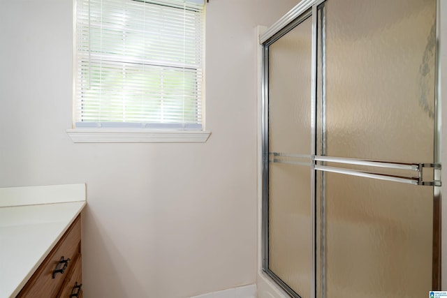 4244 Cobblestone Ct, Pinson, AL 35126 - bathroom featuring vanity and a shower with door