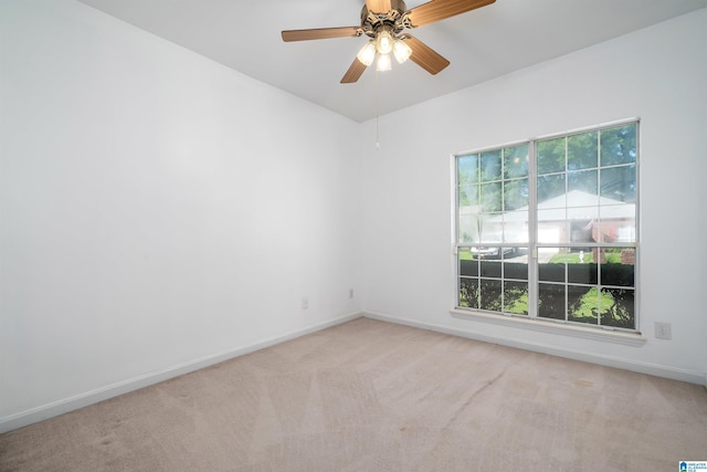 4244 Cobblestone Ct, Pinson, AL 35126 - spare room with light colored carpet, baseboards, and a ceiling fan