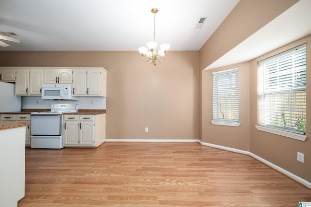 4244 Cobblestone Ct, Pinson, AL 35126 - kitchen featuring white appliances, white cabinets, a chandelier, and light wood finished floors