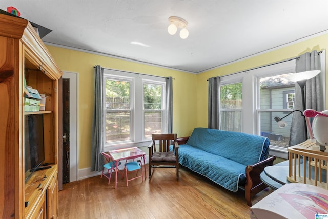784 80th St, Birmingham, AL 35206 - bedroom featuring light wood-style floors, baseboards, and ornamental molding