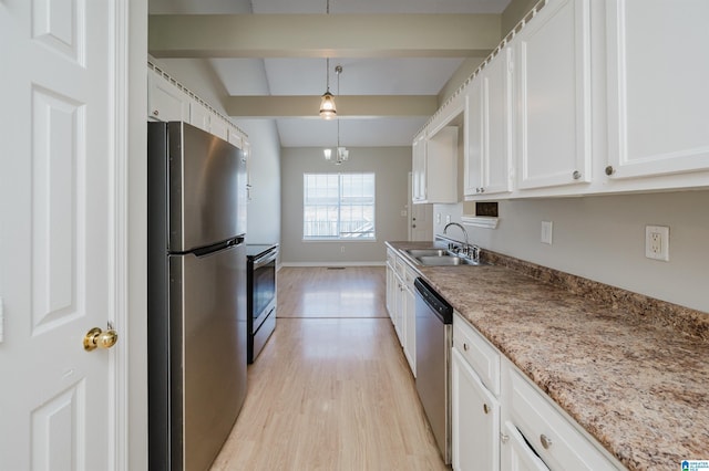 1012 Hickory St, Moody, AL 35004 - kitchen with appliances with stainless steel finishes, a sink, white cabinetry, light wood finished floors, and beamed ceiling