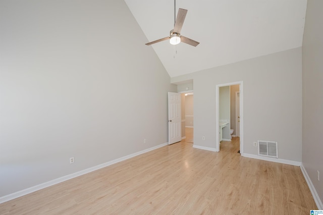1012 Hickory St, Moody, AL 35004 - unfurnished bedroom featuring high vaulted ceiling, light wood-type flooring, baseboards, and ensuite bath