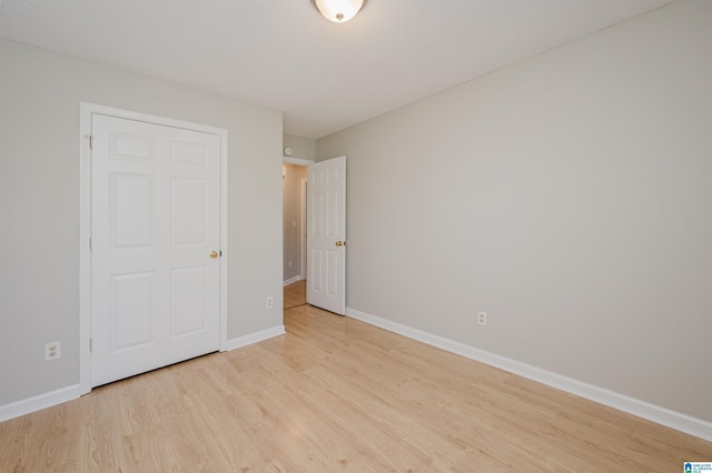 1012 Hickory St, Moody, AL 35004 - unfurnished bedroom with light wood-type flooring and baseboards