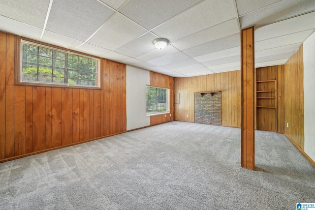 1716 Nancy Ln, Center Point, AL 35215 - basement with wood walls, carpet flooring, and a drop ceiling