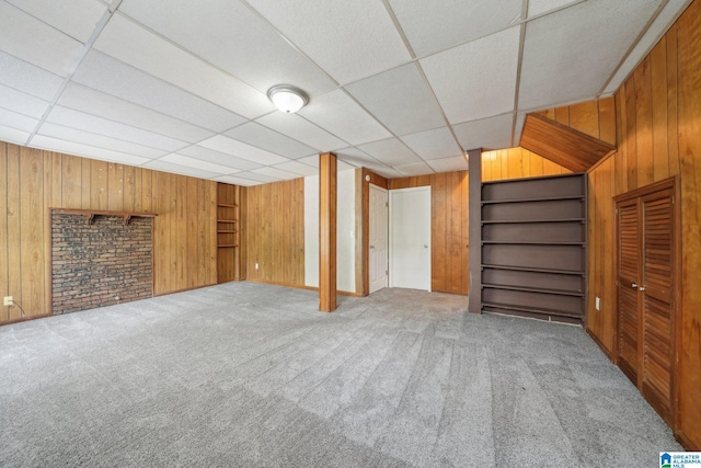 1716 Nancy Ln, Center Point, AL 35215 - finished below grade area featuring wooden walls, carpet flooring, a paneled ceiling, and built in features