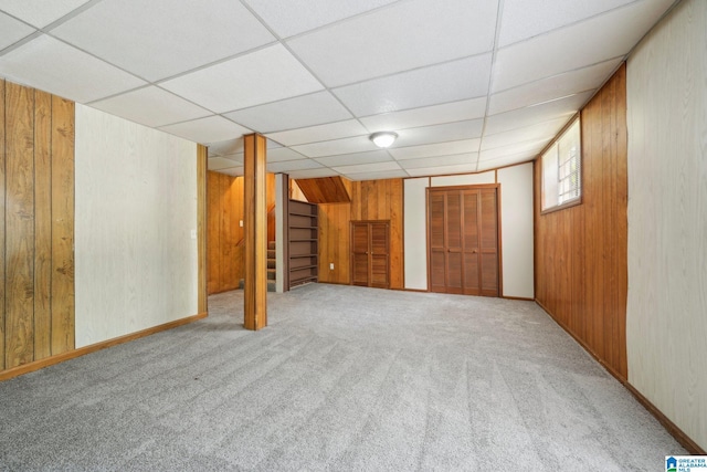 1716 Nancy Ln, Center Point, AL 35215 - below grade area with carpet, wood walls, and a drop ceiling