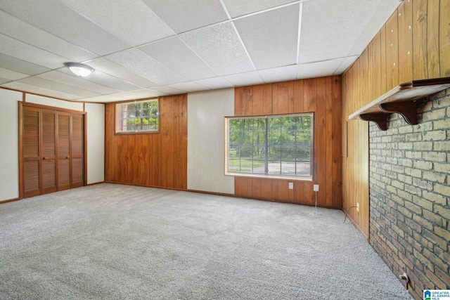1716 Nancy Ln, Center Point, AL 35215 - below grade area with carpet floors, wood walls, and a drop ceiling