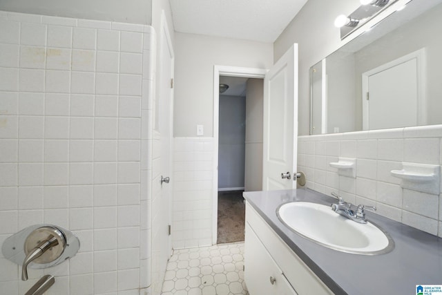 1716 Nancy Ln, Center Point, AL 35215 - bathroom featuring vanity and tile walls