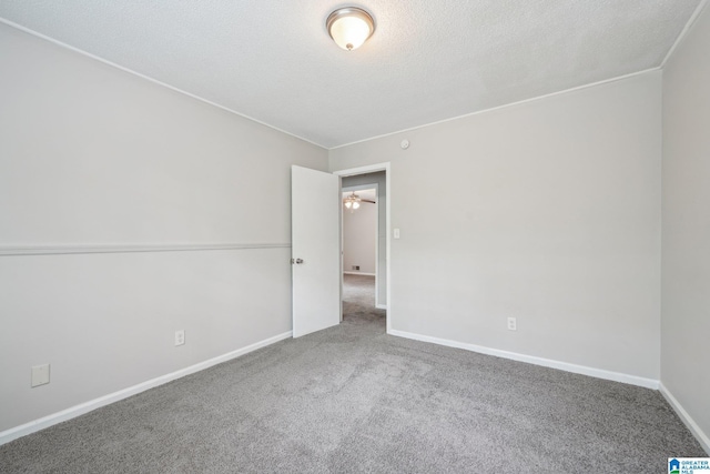 1716 Nancy Ln, Center Point, AL 35215 - carpeted spare room with a textured ceiling and baseboards
