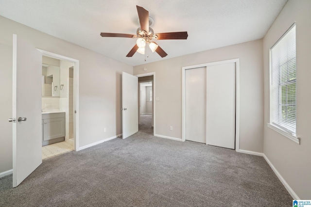 1716 Nancy Ln, Center Point, AL 35215 - unfurnished bedroom featuring carpet floors, a closet, and baseboards