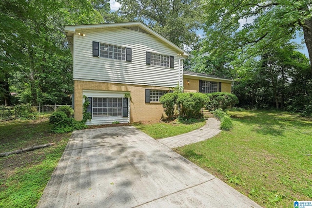 1716 Nancy Ln, Center Point, AL 35215 - split level home with brick siding and driveway