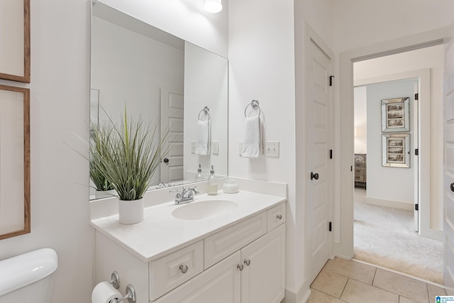 1517 Laurens St, Birmingham, AL 35242 - bathroom with vanity, toilet, and tile patterned flooring
