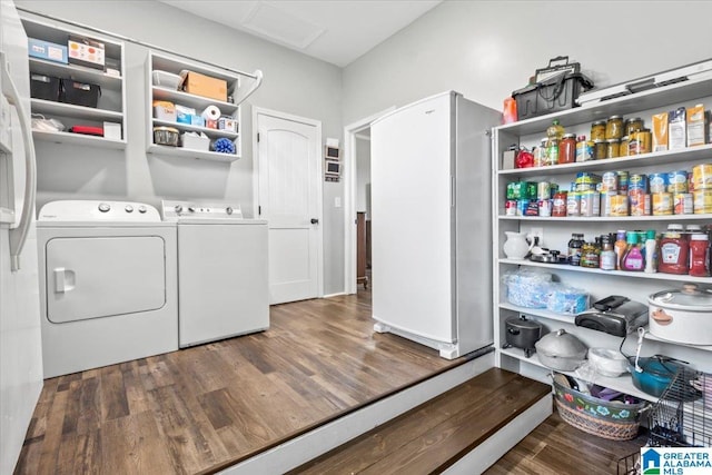 2523 County Road 222, Cullman, AL 35057 - laundry area with washing machine and clothes dryer and wood finished floors