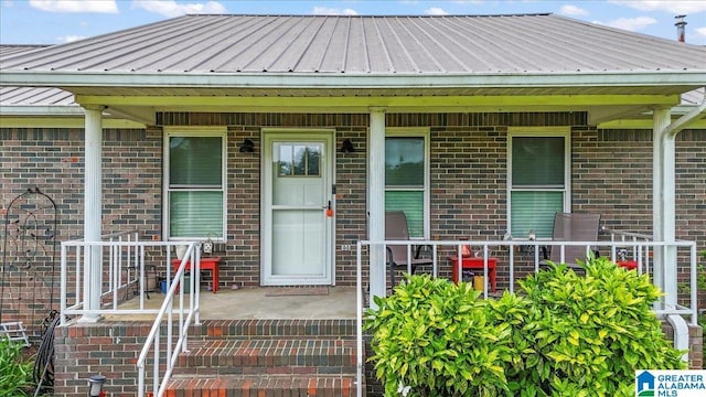2523 County Road 222, Cullman, AL 35057 - property entrance featuring brick siding and metal roof