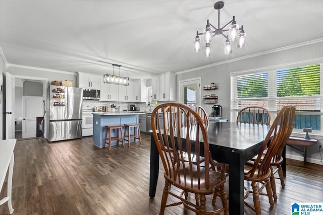 2523 County Road 222, Cullman, AL 35057 - dining space featuring a chandelier, dark wood-style floors, and crown molding