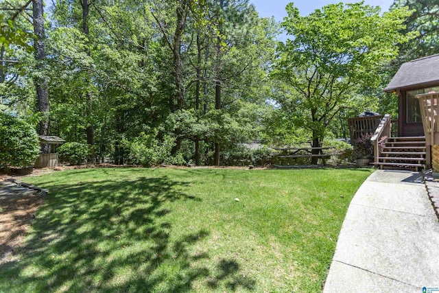 3300 Shetland Trce, Birmingham, AL 35242 - view of green lawn with a wooden deck and stairs
