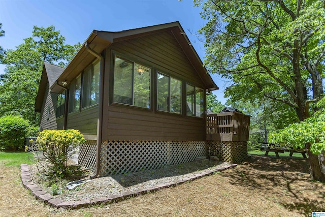 3300 Shetland Trce, Birmingham, AL 35242 - view of home's exterior featuring a sunroom and a wooden deck
