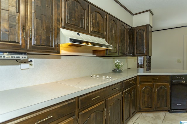3300 Shetland Trce, Birmingham, AL 35242 - kitchen featuring white electric cooktop, under cabinet range hood, ornamental molding, light countertops, and dark brown cabinetry