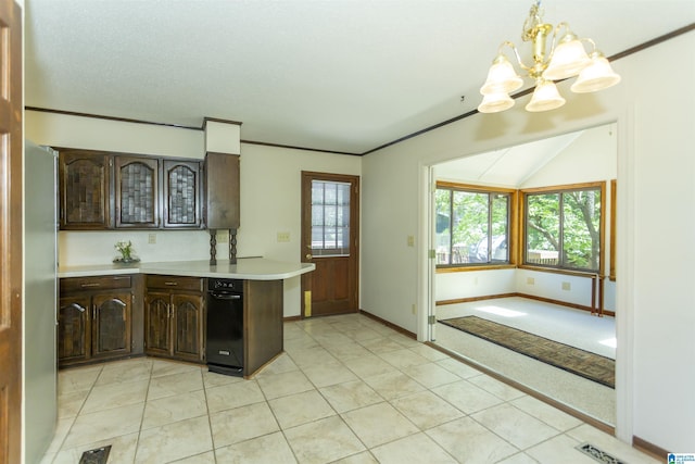 3300 Shetland Trce, Birmingham, AL 35242 - kitchen with a chandelier, light countertops, dark brown cabinetry, vaulted ceiling, and baseboards