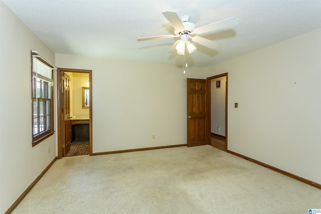 3300 Shetland Trce, Birmingham, AL 35242 - spare room featuring light carpet, baseboards, and ceiling fan