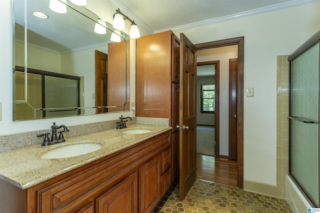 3300 Shetland Trce, Birmingham, AL 35242 - full bath featuring ornamental molding, double vanity, enclosed tub / shower combo, and baseboards