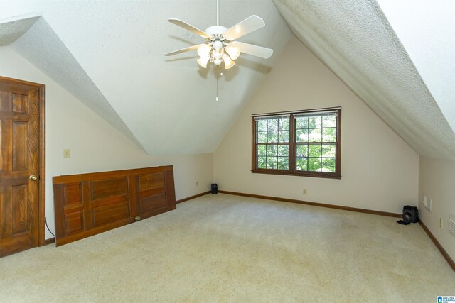3300 Shetland Trce, Birmingham, AL 35242 - bonus room featuring carpet, lofted ceiling, ceiling fan, baseboards, and a textured ceiling