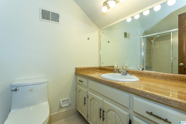3300 Shetland Trce, Birmingham, AL 35242 - full bathroom with lofted ceiling, vanity, toilet, tiled shower, and tile patterned flooring