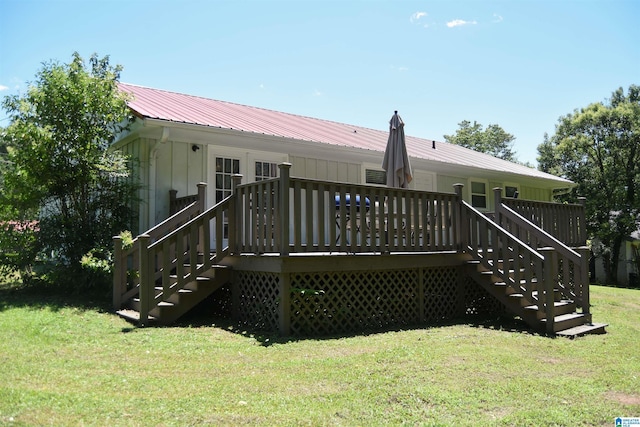 1508 Cloverdale Rd, Anniston, AL 36207 - back of property featuring stairway, a yard, a wooden deck, and metal roof