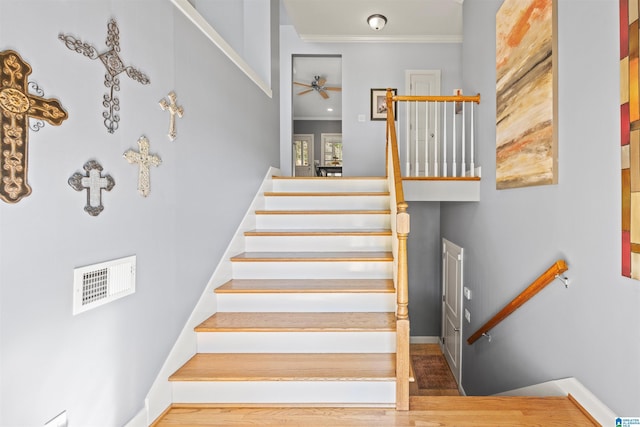 204 Pride Cir, Pelham, AL 35124 - stairs with crown molding, a ceiling fan, wood finished floors, and baseboards