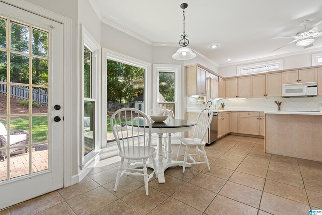 1709 Wakefield Dr, Hoover, AL 35216 - dining space featuring light tile patterned floors, ornamental molding, plenty of natural light, ceiling fan, and recessed lighting