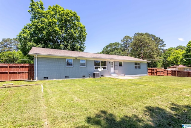 1826 Edwardian Way, Anniston, AL 36207 - back of property with a patio area, cooling unit, crawl space, and brick siding