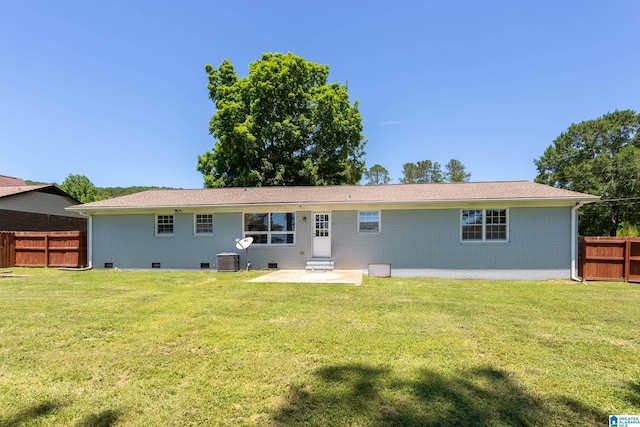 1826 Edwardian Way, Anniston, AL 36207 - rear view of house featuring a patio, cooling unit, and brick siding