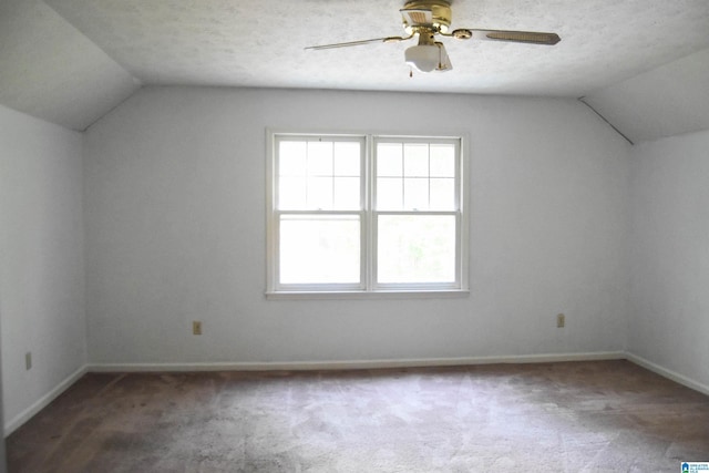 2301 Hathaway Heights Rd, Anniston, AL 36207 - bonus room with lofted ceiling, carpet floors, ceiling fan, and baseboards