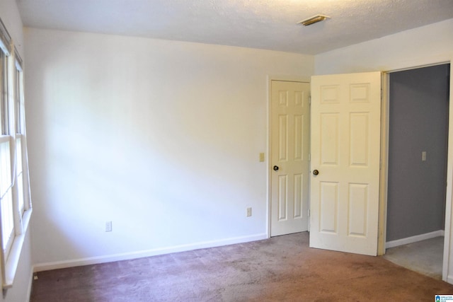 2301 Hathaway Heights Rd, Anniston, AL 36207 - unfurnished bedroom with carpet floors and baseboards