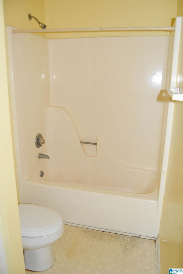 2301 Hathaway Heights Rd, Anniston, AL 36207 - bathroom featuring tile patterned floors, toilet, and shower / tub combination