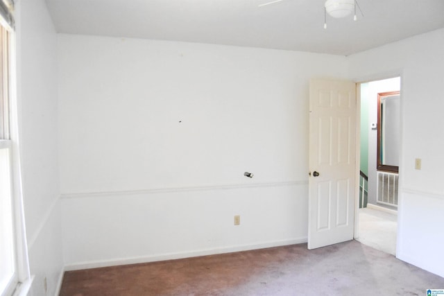 2301 Hathaway Heights Rd, Anniston, AL 36207 - carpeted empty room featuring a ceiling fan and baseboards