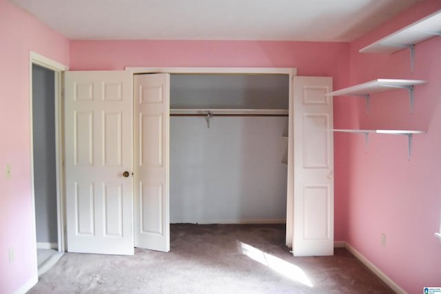 2301 Hathaway Heights Rd, Anniston, AL 36207 - unfurnished bedroom featuring carpet and a closet