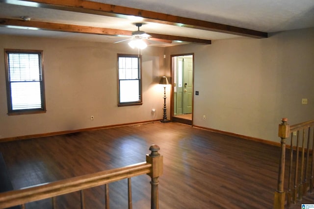 2301 Hathaway Heights Rd, Anniston, AL 36207 - empty room with plenty of natural light, beamed ceiling, wood finished floors, and ceiling fan