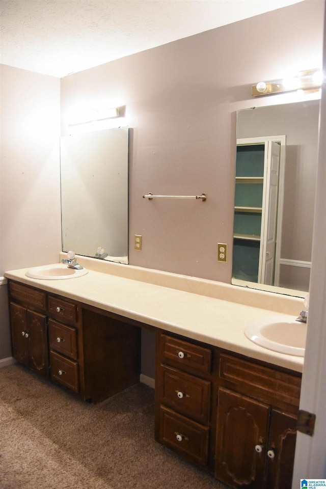 2301 Hathaway Heights Rd, Anniston, AL 36207 - bathroom featuring double vanity and carpet