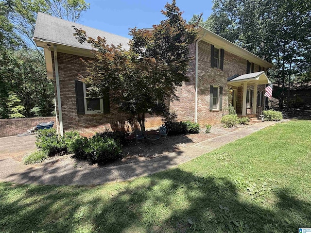 2301 Hathaway Heights Rd, Anniston, AL 36207 - view of front of property featuring a front yard and brick siding