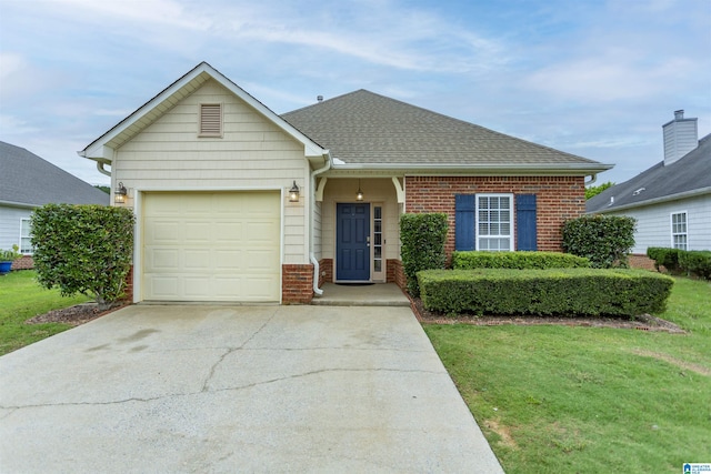 1009 Fairbank Ln, Chelsea, AL 35043 - view of front of house featuring concrete driveway, brick siding, a front yard, and an attached garage