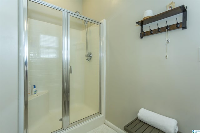1009 Fairbank Ln, Chelsea, AL 35043 - bathroom featuring a shower stall and baseboards