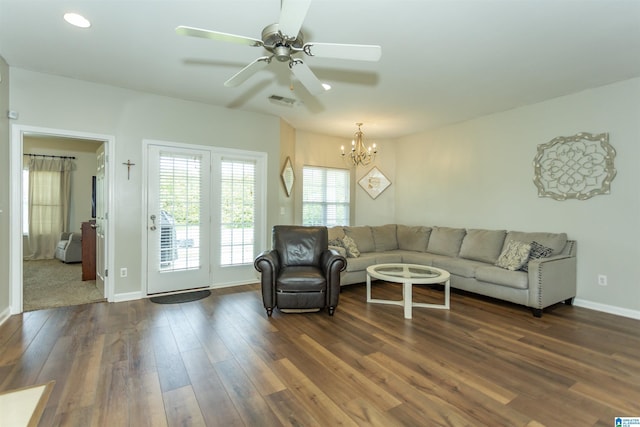 1009 Fairbank Ln, Chelsea, AL 35043 - living room with dark wood-type flooring, a chandelier, a ceiling fan, and baseboards