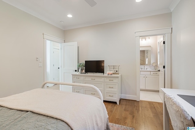 3 Troon, Birmingham, AL 35242 - bedroom featuring ornamental molding, recessed lighting, light wood-style floors, connected bathroom, and a sink