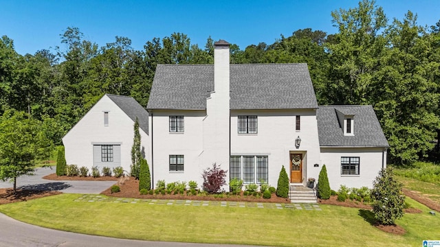 3 Troon, Birmingham, AL 35242 - view of front facade with a front lawn, roof with shingles, and a chimney