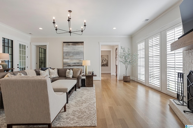 3 Troon, Birmingham, AL 35242 - living room featuring a chandelier, healthy amount of natural light, crown molding, light wood finished floors, and recessed lighting