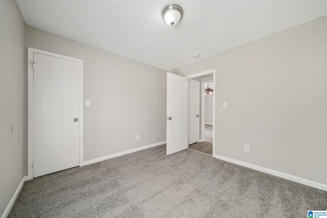 1056 Cardinal Cir, Hueytown, AL 35023 - unfurnished bedroom featuring carpet and baseboards