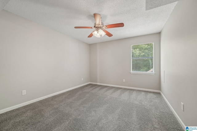 1056 Cardinal Cir, Hueytown, AL 35023 - carpeted spare room featuring a textured ceiling, a ceiling fan, and baseboards